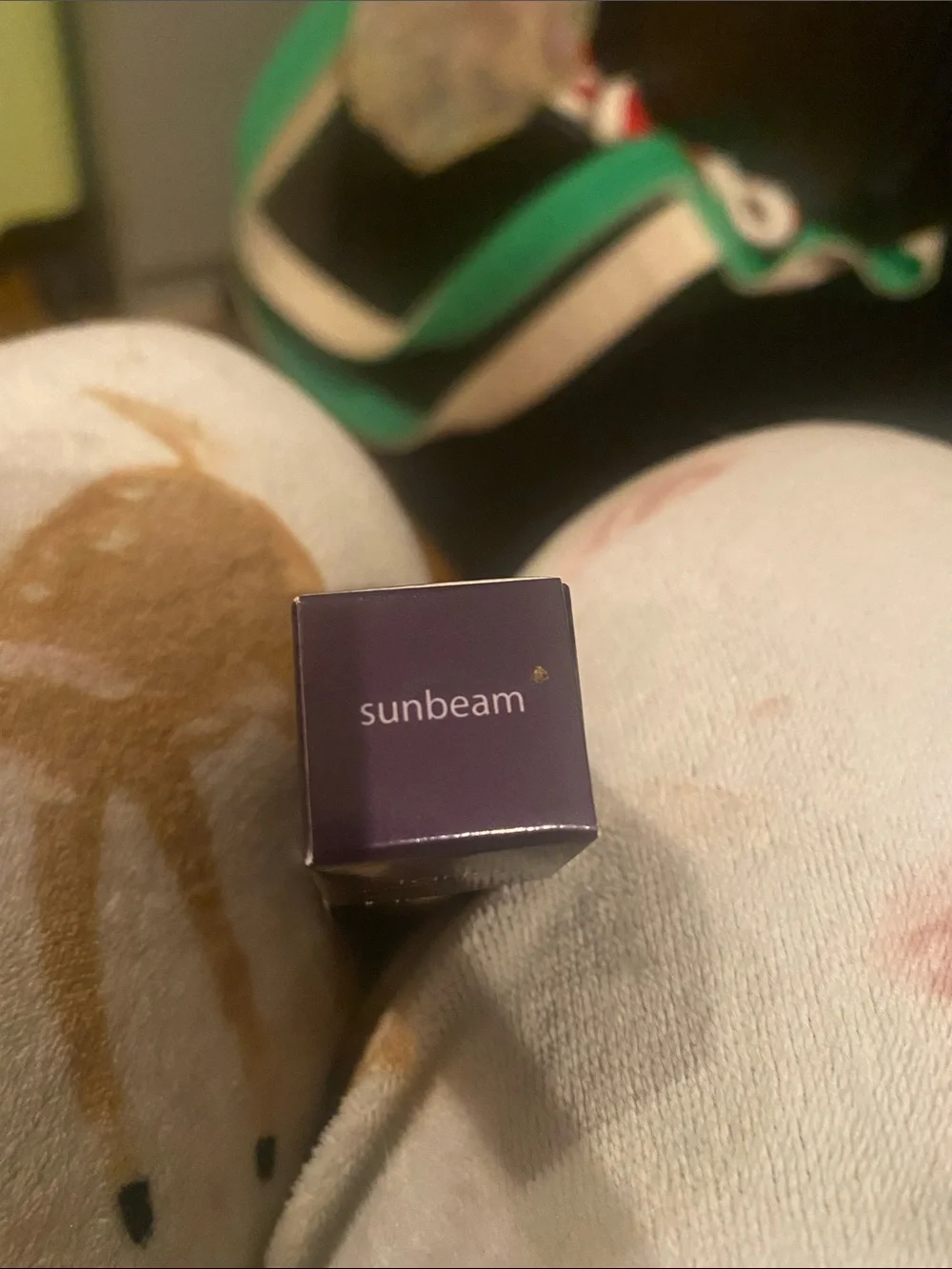 tarte Sunbeam Highlighter Stick — Gold with Purple Cap
